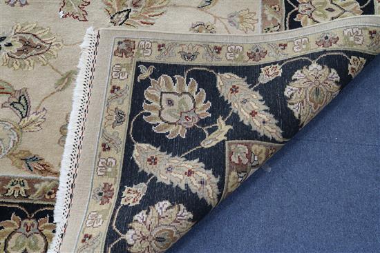A Tabriz style carpet, 12ft 2in. x 9ft 1in.
